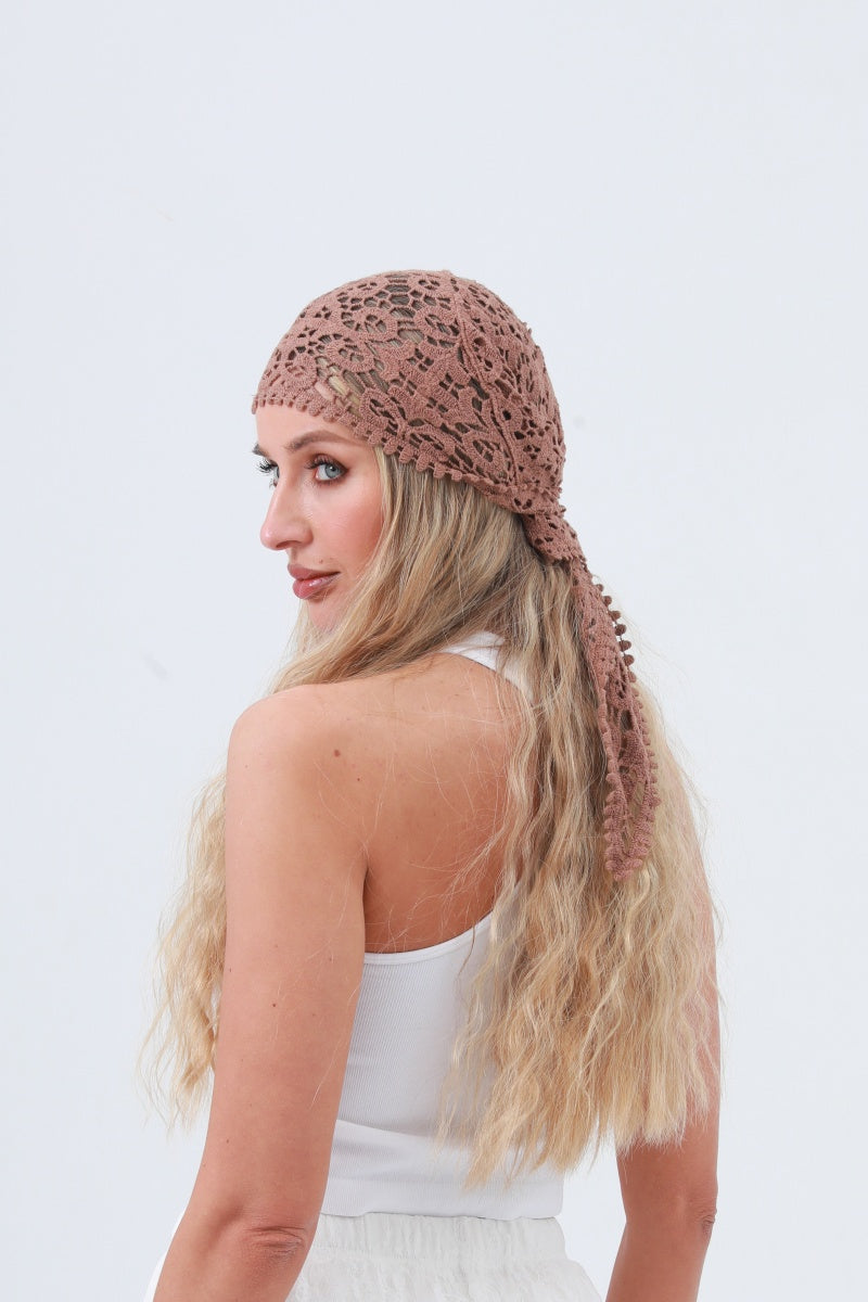 Trestles Clothing Company dusty rose cotton crochet bandana worn by a blonde woman with a boho openwork design